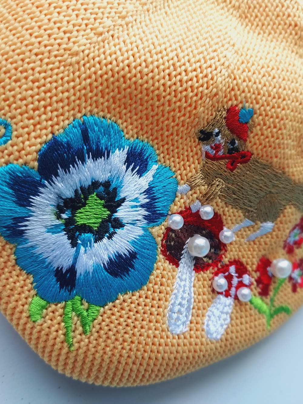 Embroidered Orange Knit cat with Blue Flower & Mushroom Accents Hat